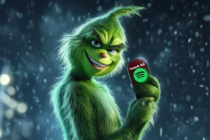 Grinch holding Spotify button to Insert Ad