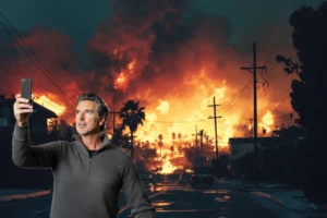 Governor Newsome taking a selfie in front of wildfires wearing Patagonia