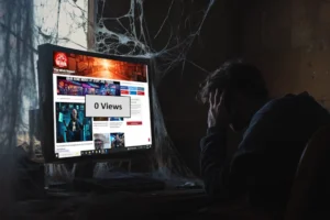 disappointed man looking at website with zero views