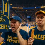 Fan with foam finger blocking court of game 6 NBA Finals