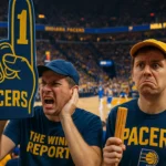 Fan with foam finger blocking court of game 6 NBA Finals